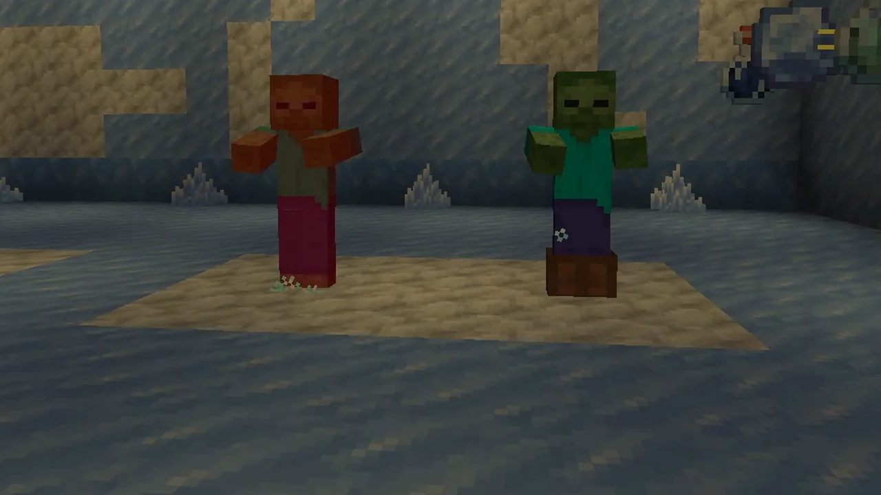 Dos zombis lado a lado: el de la izquierda, sin armadura, rojo por el daño; el de la derecha, con botas de cuero, verde y sin daño